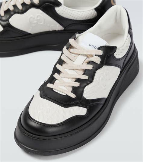 gucci gg embossed leather sneakers|silver gucci sneakers women's.